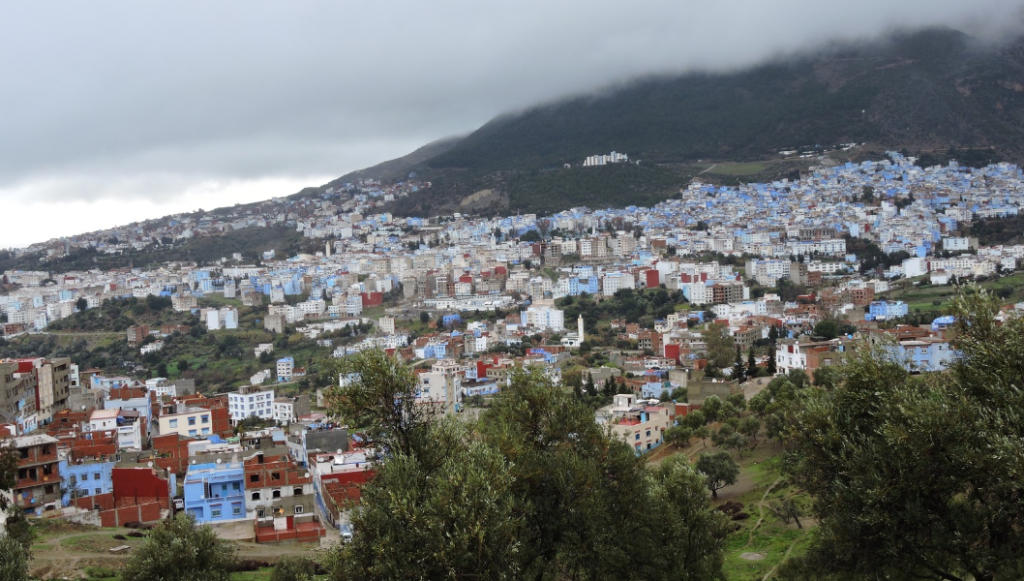 Blue-painted street in Chefchaouen on a spring morning